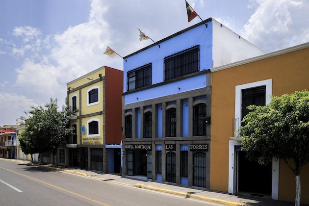 Gallery - Capital O Hotel Boutique Las Torres